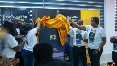 Ofei-Agyeman (second from right) and some staff unveiling the App at the launch