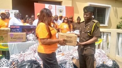 • Ms Philippine Gordor (left) presenting the items to Chief Supt Mr Isaac Boakye