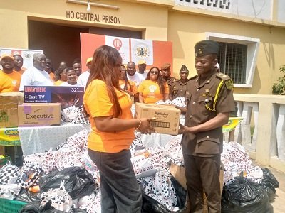• Ms Philippine Gordor (left) presenting the items to Chief Supt Mr Isaac Boakye