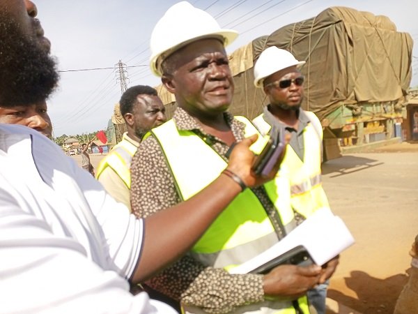 Mr Asare briefing journalists at the site