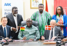 • Mr Opoku (seated middle) and Mr Skaksen (left) signing the MoU