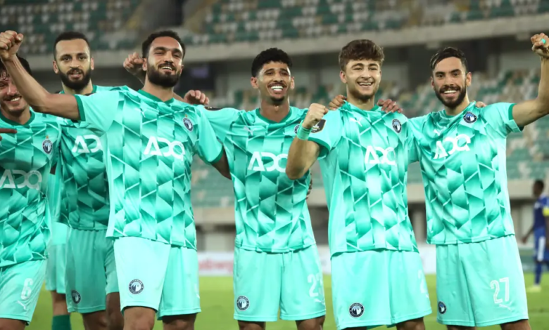 • Players of Pyramids FC celebrating a goal during their game against Rivers United