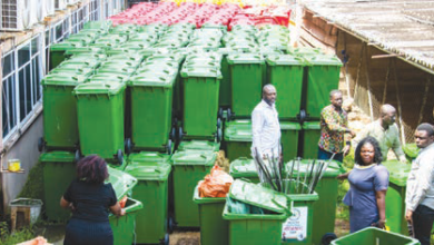 Ms Rita Naa Odoley Sowah (sixth from left) symbolically handing over the items to Ms Linda Ocloo