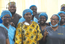 A team of renal health experts with the first patient