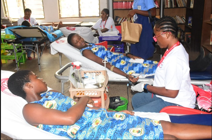 Some of the students donating blood after the launch