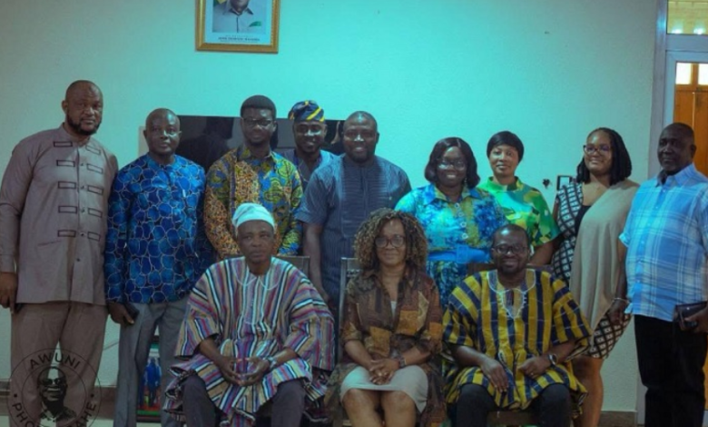 • Mr Ali Mburidiba (seated left) with the NCA team during the visit