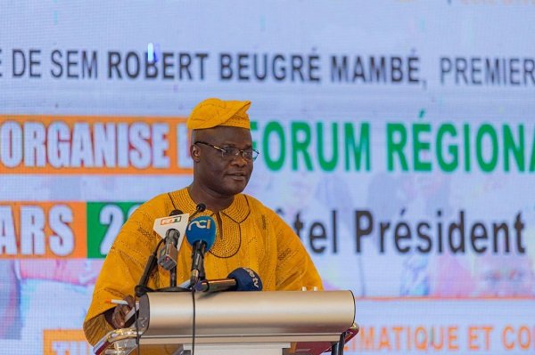 Mr Ahmed (inset) speaking at the programme