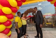 Madam Pazmino (middle) supported by other dignitaries to inaugurate the showroom