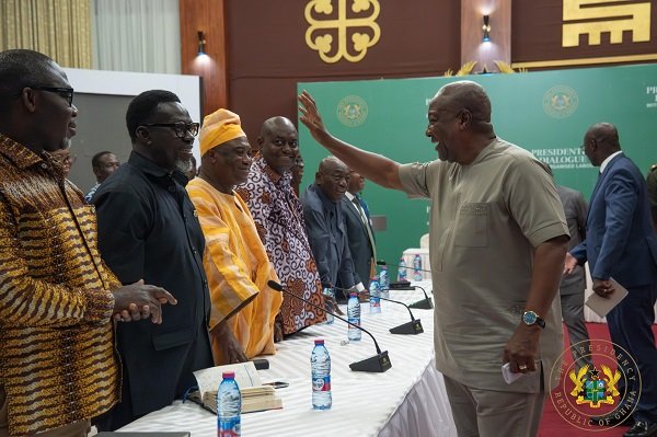 President Mahama interacting with some union leadership at the dialogue