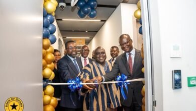 The Chief of Staff, Julius Debrah (middle) being assisted by Dr Asiama (left) and Dr Zakari (right) inagurate the CISD office