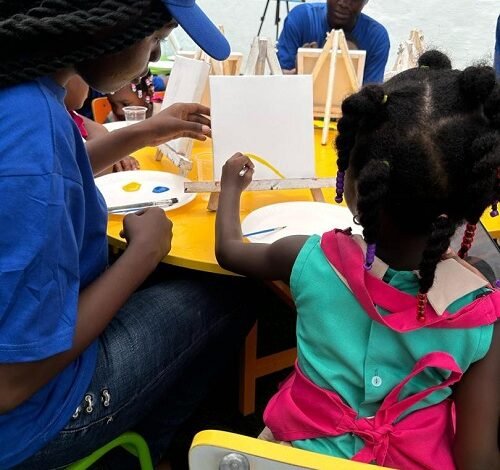 -Students participating in structured learning activities at the launch