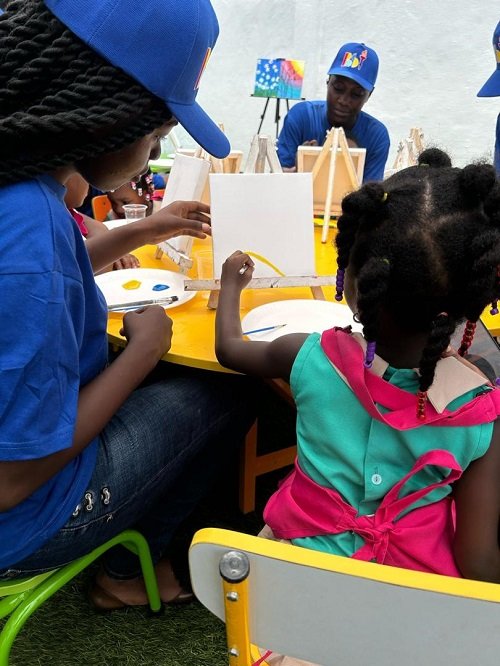 -Students participating in structured learning activities at the launch