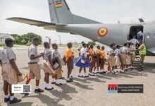 Students onboarding Ghana Armed Forces plane during their visit .jpg