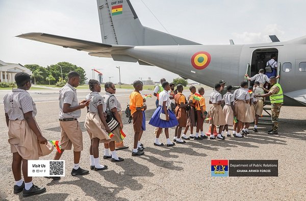 Students onboarding Ghana Armed Forces plane during their visit .jpg