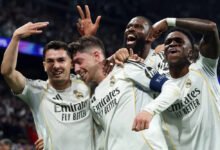 Federico Valverde (middle) celebrates with his team-mates