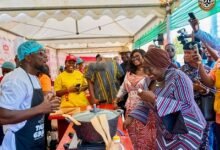 -Abla Dzifa Gomashie (right), with Maame Efua Houadjeto (second from right) inspecting the celebrity cooking competition