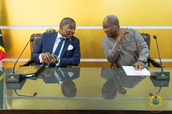 -President Mahama (right) with Dr Drew after signing the agreement