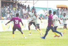 Gold Stars players join Atta Kumi to celebrate the opening goal