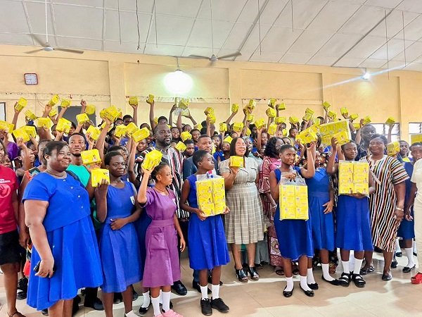 Ms Ocloo (middle) with some beneficiary students and teachers of Tetteh Ocloo School for the Deaf during the distribution exercise