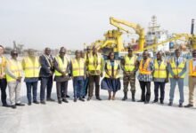 Mr Nikpe (middle) with some ministers and dignitaries during his visit to the Tema Harbour