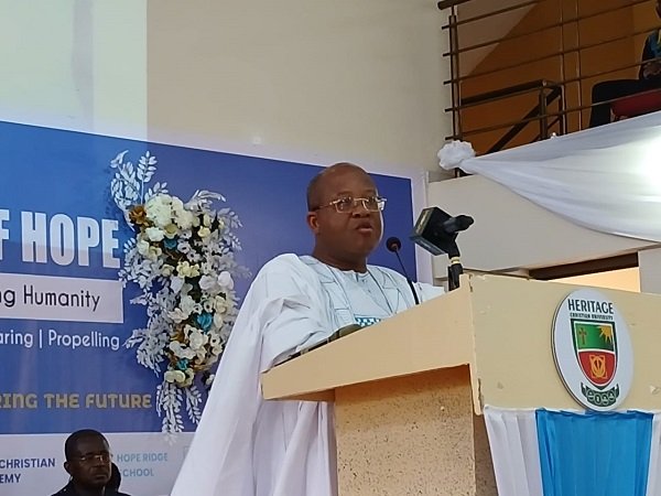 -Mr Asare (inset) speaking at the event