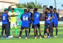 Head Coach Baffour signs with some of the Black Wonders players ahead of the match
