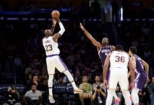 LeBron James (23) shooting the ball against Sacramento Kings forward, Precious Achiuwa (9), during the first quarter