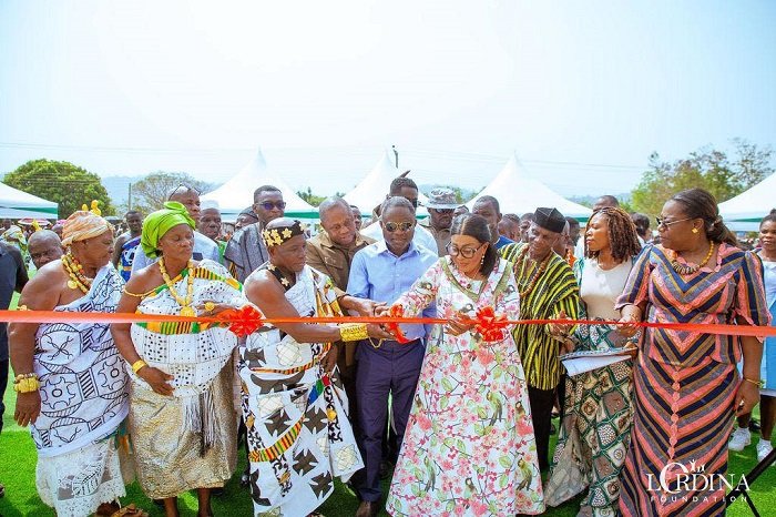 First Lady Lordina Mahama (fourth from right) cutting the tape to commission the facility