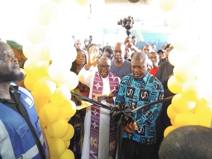 MTN handsMr James Gunu (right) cutting the tape to inaugurate the facility