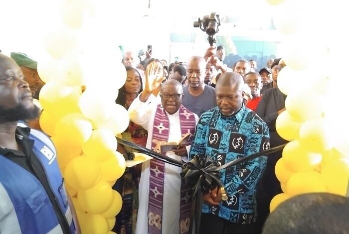 MTN handsMr James Gunu (right) cutting the tape to inaugurate the facility