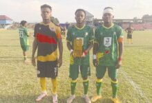 Man of the Match Amponsah (middle) Flankled to the left by the Most Promising Player Koulibaly of Liberty Youth and best defender Boakye