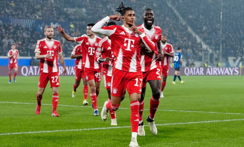 Michael Olise celebrates scoring the second goal