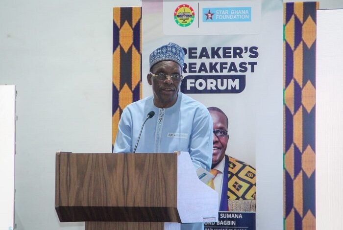 Mr Bagbin, (inset) speaking at the forum