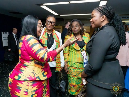 Mrs Mahama (left) interacting with other guests at the programme