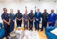 IGP Mr. Yohuno (fourth from right), with some senior Police officers and the delegation
