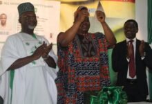 Ibok-Ete Ekwe Ibas(middle) showcasing the new welfare card