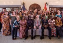 Mr Olson (seated middle) with Dr Apaak (third from right), the peace corps and other dignitaries at the programme