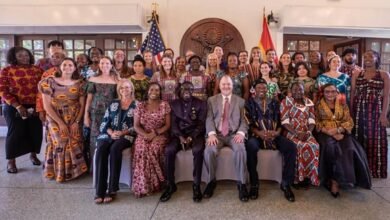 Mr Olson (seated middle) with Dr Apaak (third from right), the peace corps and other dignitaries at the programme