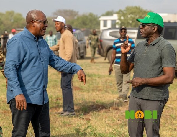 Pres Mahama highlights ----President Mahama (left) interacting with Mr Awuah-Darko during the visit