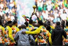 • Senegal players and officials parade the AFCON trophy around the stadium before their international friendly against Peru on Saturday