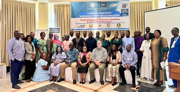 Mr Azortibah (seated right) with Mr Beers (seated, third from right) and other dignitaries at the programme