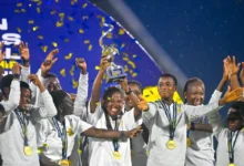 The Ghana girls team celebrating the trophy they won at the previous edition