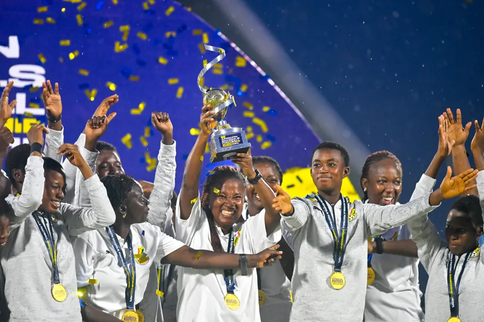 The Ghana girls team celebrating the trophy they won at the previous edition