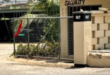 The entrance of the Public Health Work Department headquarters, marked with a red band