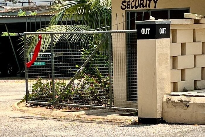 The entrance of the Public Health Work Department headquarters, marked with a red band
