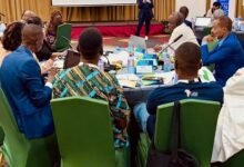 • Mr. Jinapor (middle), Dr. William Amuna (right) and Mr. Richard Gyan-Mensah applauding after launching the ECG Corporate Strategic Plan. Photo: Ebo Gorman