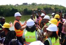 Mr Adam Mutawakilu (second from left) briefing Mr Gilbert Adjei (second from right) on activities at the Weija Water Works Photo Seth Osabukle