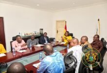 Ms Genevieve Shirley Lartey, (head of table) with Mr Emmanuel Kwasi Bedzrah, on her immediate left and members of the Caucus.