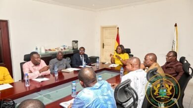 Ms Genevieve Shirley Lartey, (head of table) with Mr Emmanuel Kwasi Bedzrah, on her immediate left and members of the Caucus.