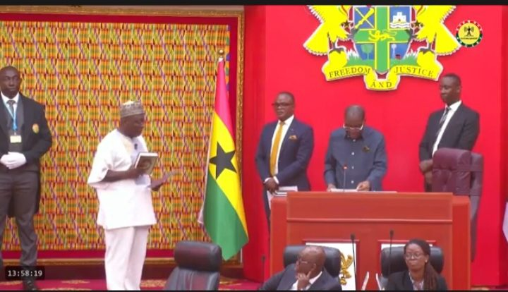 • Mr Bagbin swearing in Alhaji Baba Jamal (left) in the Chamber of Parliament yesterday